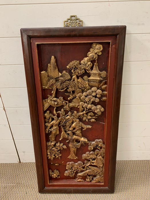 A carved wall hanging Japanese plaque (93cm x 45cm)