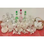 A very large collection of various age glass decanters and stoppers
