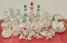 A very large collection of various age glass decanters and stoppers