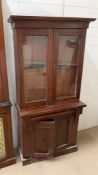 A mahogany glazed bookcase with cupboard doors to base (2parts) (H178cm W92cm D35cm)AF