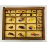 A selection of framed fly fishing hooks