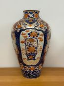 A Substantial 18th Century / 19th Century Imari vase with extensive repairs.