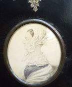 A portrait of "Miss. Betey Henec (?)", unsigned, watercolour on paper, within a black victorian