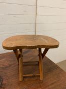 A small wooden folder up stool (H24cm W32cm D21cm)