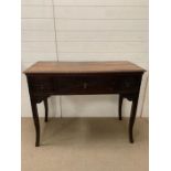 An oak secretaries or escritoire side table (H89cm W117cm D52cm)