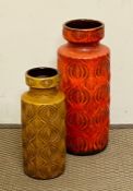 Two large ceramic vases with wave design