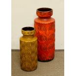 Two large ceramic vases with wave design