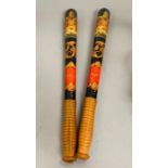 A Pair of early hand painted truncheons marked Ardleigh