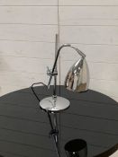 A chrome angle poise contemporary lamp