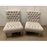 A Pair of linen button back and seat low chairs (Height 85 cm, width 59cm and seat height 40cm)