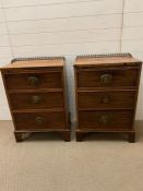 A pair of bedside with brass galleried top and bracket feet (H87cm W58cm D38cm)