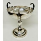 A Chinese three handled cup by silversmiths Luenwo (575g)