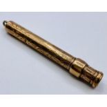 A 9ct gold cheroot holder (9.5g)