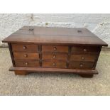 A Laura Ashley low table with multi drawers to front, open to reveal storage (H41cm W91cm D62cm)