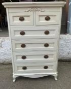 A Laura Ashley boudoir style two over four chest of drawers on cabriole legs (H138cm W90cm D54cm)