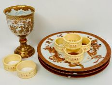 A small selection of Japanese, oriental items to include three plates, napkin rings and tea bowl