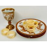 A small selection of Japanese, oriental items to include three plates, napkin rings and tea bowl