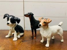 Two Beswick dogs and one other