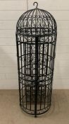 A metal cage wine rack (H150cm)