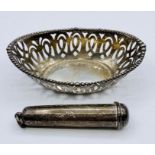 A small hallmarked silver pierced bowl and a silver hallmarked cheroot holder (40g)