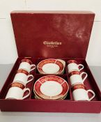 A boxed coffee can and saucers set "Elizabetham" Burgundy