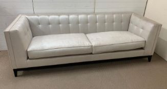 A large three seater Alexander square sofa with button back possibly by The Sofa and Chair