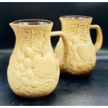 Two West German jugs with fruit design