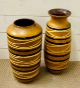 Two tall West German vases with a black and white strip design