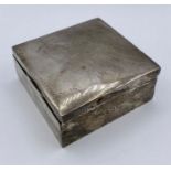 A silver cigarette box, makers mark WA and hallmarked for Birmingham.