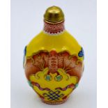 A Chinese scent bottle on yellow grounds.