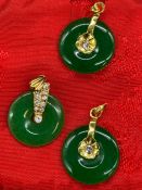 Three 18ct gold and Jade pendants