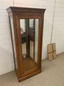 A reproduction display case stamped, made in France (H163cm W69cm D42cm)