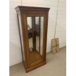 A reproduction display case stamped, made in France (H163cm W69cm D42cm)