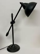 A Contemporary Industrial style desk lamp.