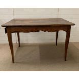 A French oak farm house table, three plank top with drawer C1840's (H78cm W128cm D83cm)