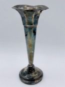 A silver sing stem vase, hallmarked for Sheffield.