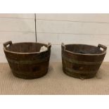 Two wooden buckets with brass banded handles