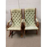 A match pair of oak chairs, one rocking chair