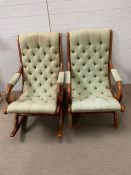 A match pair of oak chairs, one rocking chair