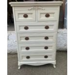 A Laura Ashley boudoir style two over four chest of drawers on cabriole legs (H138cm W90cm D54cm)