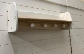 A four hook wall shelf by Pin (82 cm w x 18cm d x 26cm h)