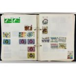A selection of five stamp albums to include four worldwide and one United Kingdom.