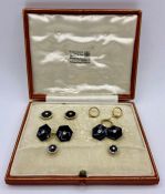 A part set of 18ct and 9ct cuff links and shirt stud set with inset diamonds.