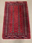 A Red Ground rug (W 95cm x L 150cm) Lined