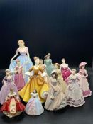 A selection of thirteen china figurines to include Coalport, Royal Doulton etc.