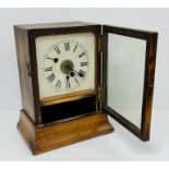 A wooden mantel clock