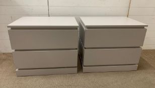 A pair of light grey bedsides with two soft closing drawers (H60cm W70cm D50cm)