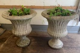 A pair of reclaimed pedestal garden urn planters (H70cm W60cm)