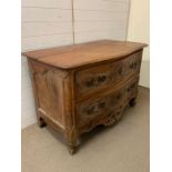A 18th century style commode with ormolu carving. Two drawers and metal mounts (H87cm W130cm D72cm)