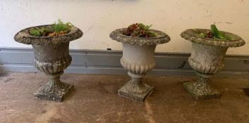 A trio of salvage urn shape garden planters (H46cm Dia40cm)